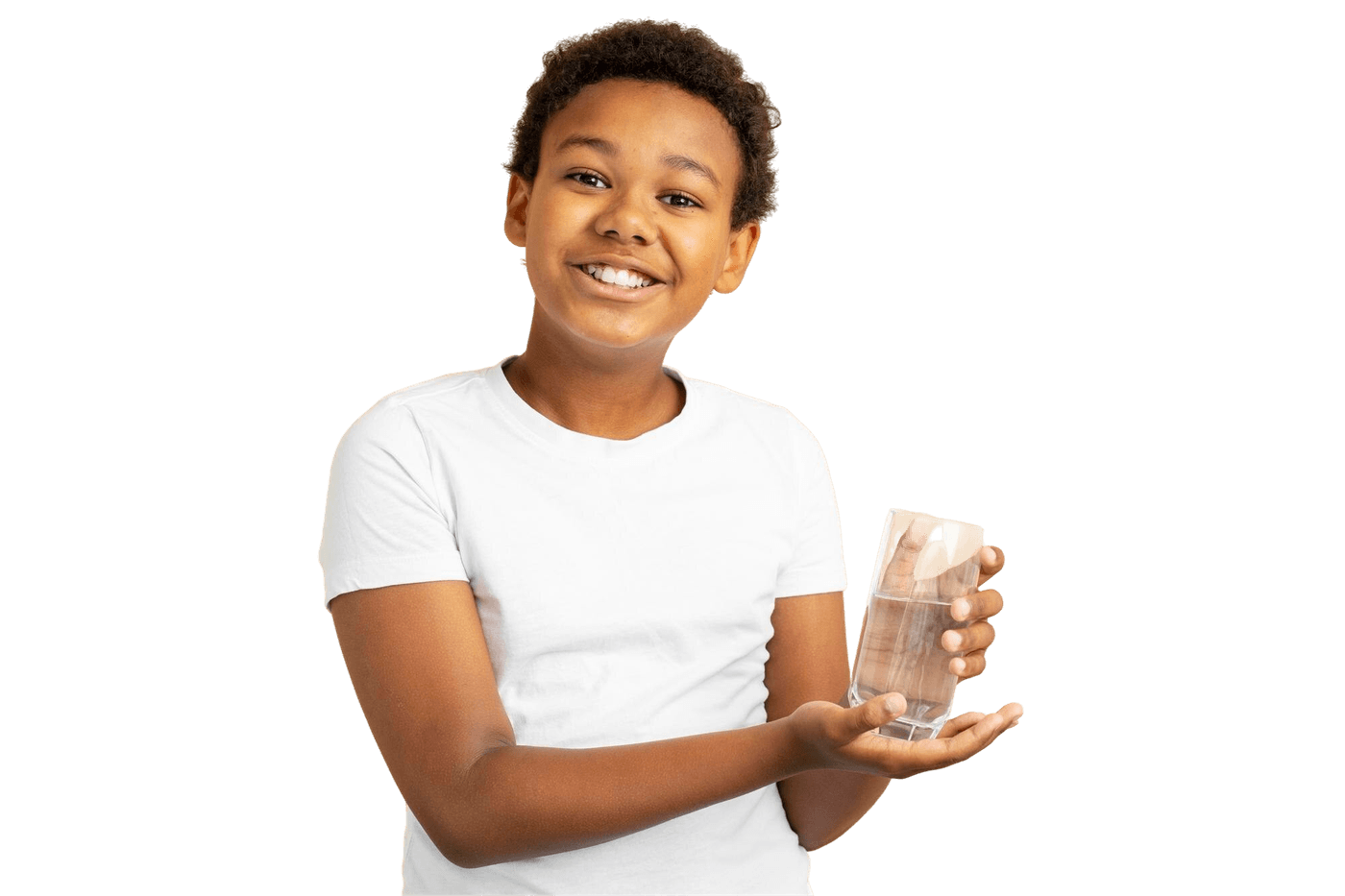 Smiling boy holding a glass of clean filtered water